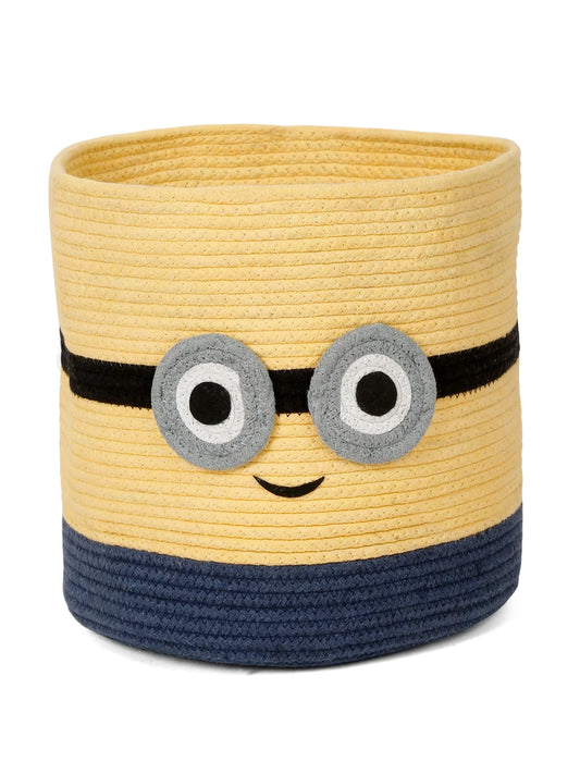 Yellow minion-inspired laundry hamper with cartoon face