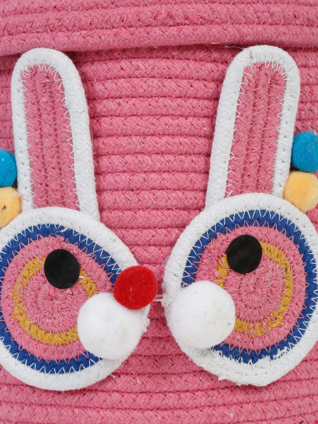 Decorative pink bunny laundry bin for nursery